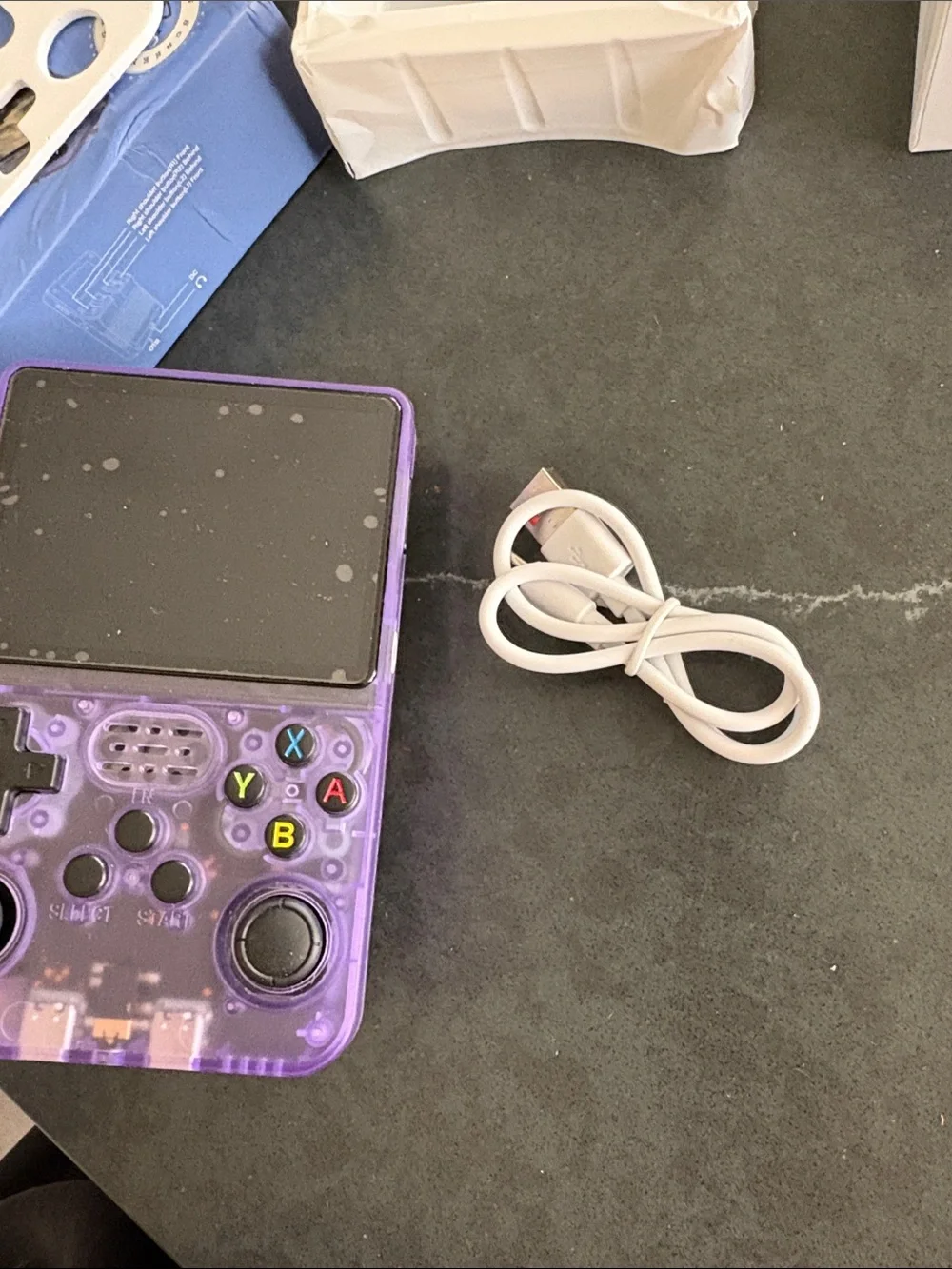 Portable Purple Retro Handheld Gaming Console with Dual Analog Sticks